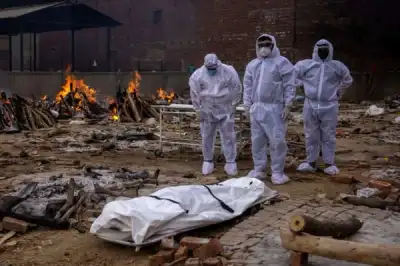 Image for India crowdfunds millions for its weary crematorium workers