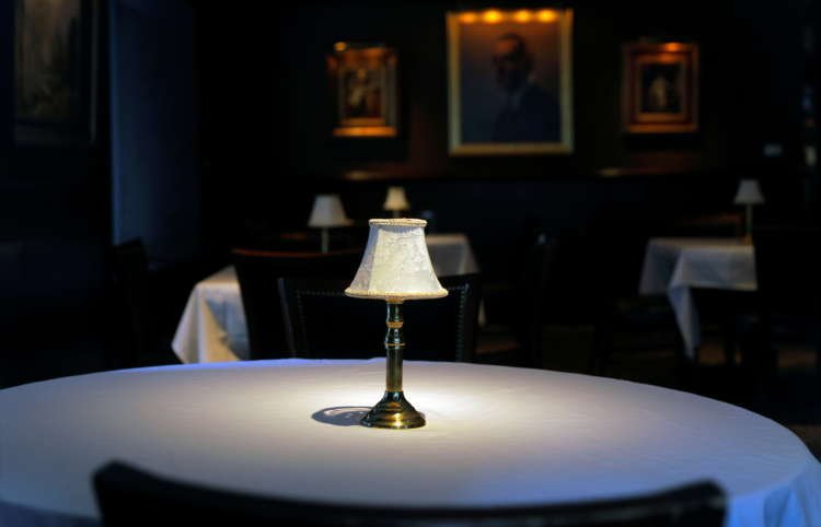 Empty tables in a closed New York restaurant highlight COVID-19's impact on the U.S. economy - Global Banking & Finance Review