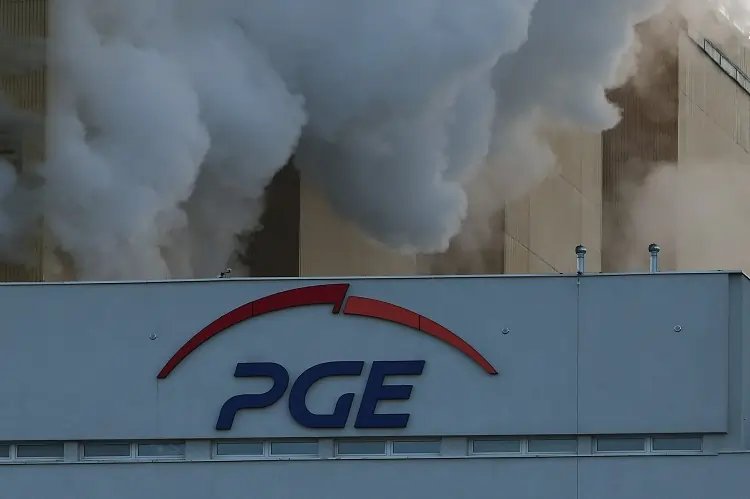 Poland's PGE utility building with coal power plants, reflecting impact on profits - Global Banking & Finance Review