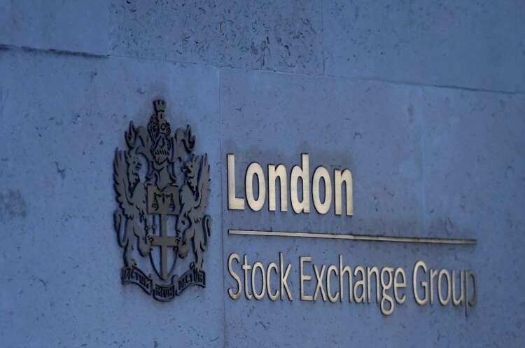 Image for FTSE 100 slides on economy worries, weak IAG results