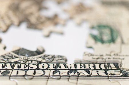 Illustration of banknotes in a puzzle layout, symbolizing asset-based loans for small businesses - Global Banking & Finance Review