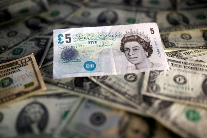 Image for Dollar sinks, sterling jumps as market turns to risk assets