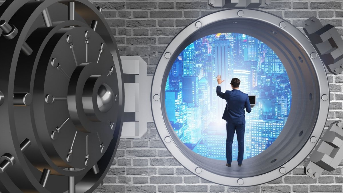 A bank employee monitors cybersecurity systems to counteract sophisticated threats - Global Banking & Finance Review