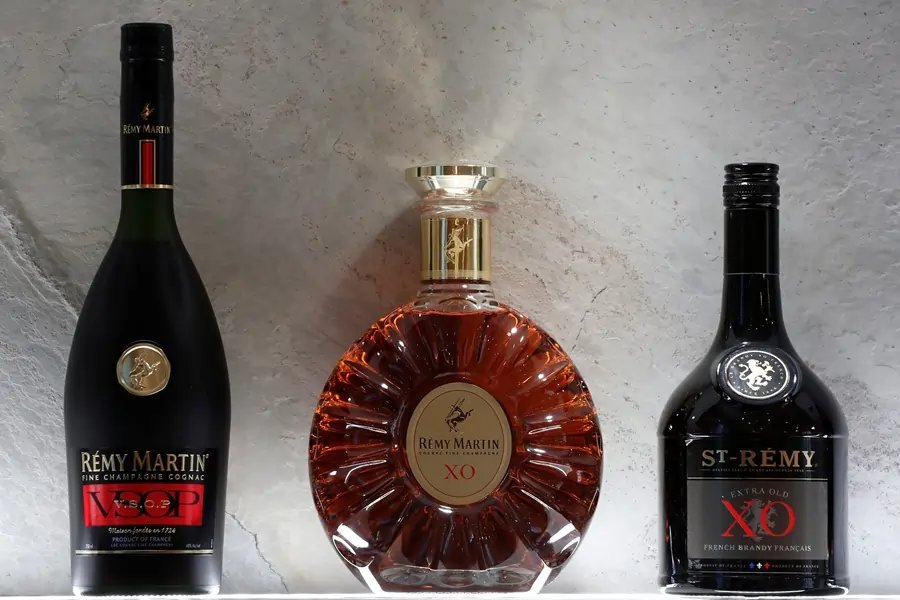 Brandy bottles representing French exports affected by China's tariffs - Global Banking & Finance Review
