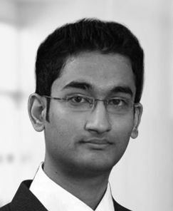 Business professional analyzing data on a digital screen - Global Banking & Finance Review