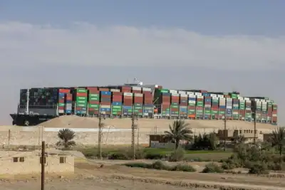 Image for Insurer of ship that blocked Suez Canal says reduced claim still high