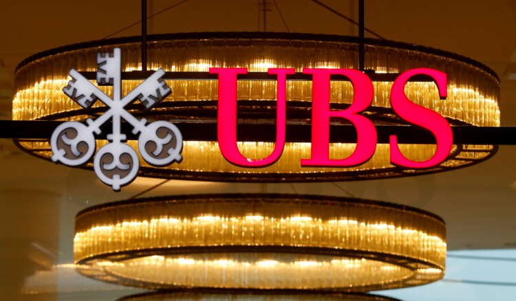 FILE PHOTO: The logo of Swiss bank UBS is seen at a branch office in Basel