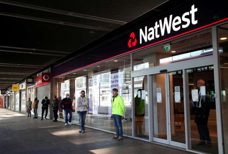 Image for NatWest returns to profit after releasing cash for bad loans
