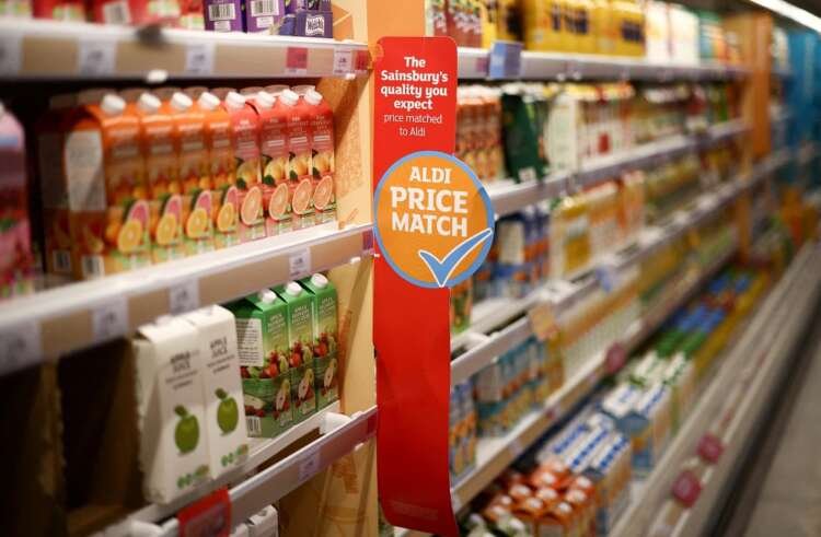 Food shelves in a Sainsbury's supermarket illustrating rising UK grocery prices - Global Banking & Finance Review