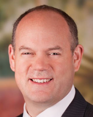 Image of Neil Gray discussing mobile voice recording challenges in finance - Global Banking & Finance Review