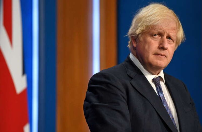 Image for UK PM Johnson reverses plan to skip quarantine after COVID exposure