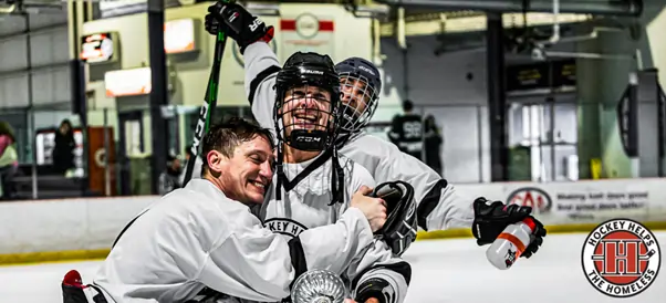 Hockey players engaging in a charity event to combat homelessness in Canada - Global Banking & Finance Review