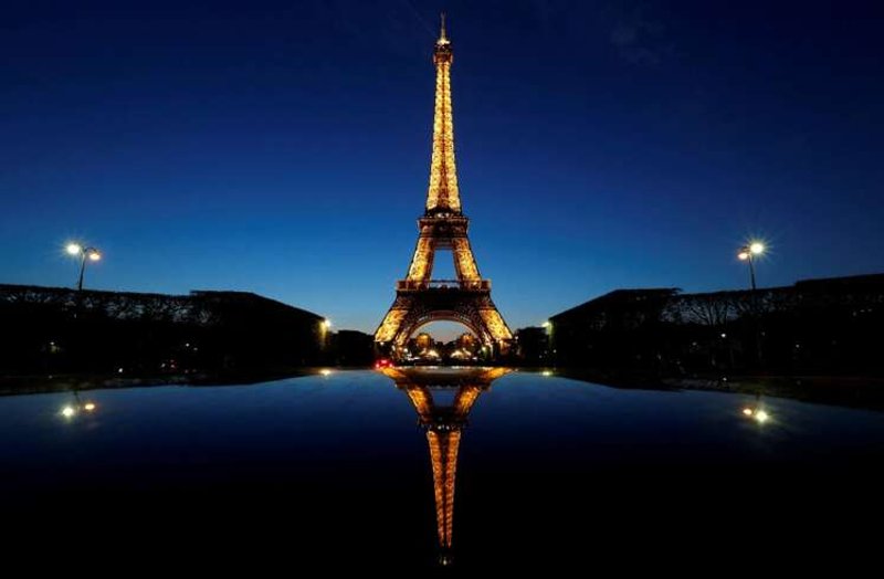 Image for Lights out early for Eiffel Tower as Paris saves energy