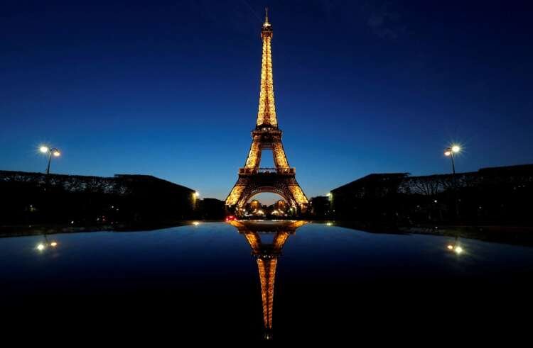 Image for Lights out early for Eiffel Tower as Paris saves energy
