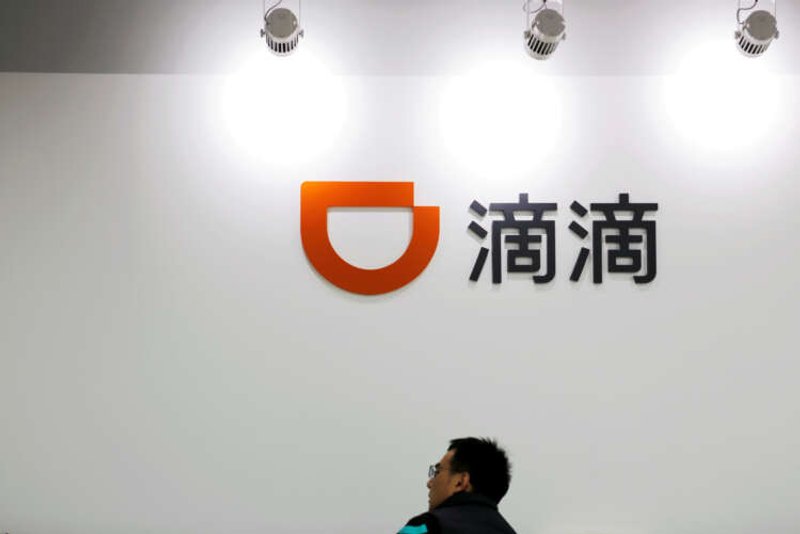 Image for China’s ride-hailing giant Didi sets stage for mega New York float