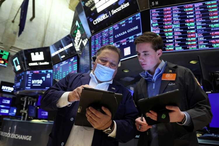 Image for Wall Street pulls back on stocks, Treasury yields dip