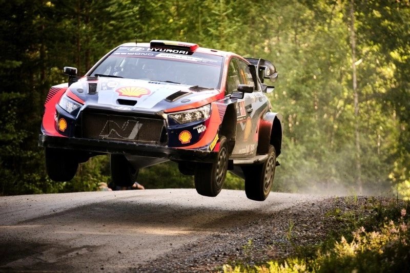 Rally car competing in the World Rally Championship, representing high-stakes sports media sale - Global Banking & Finance Review