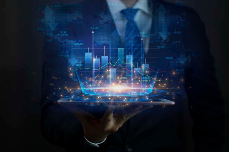 Businessman analyzing private capital market data on a tablet - Global Banking & Finance Review