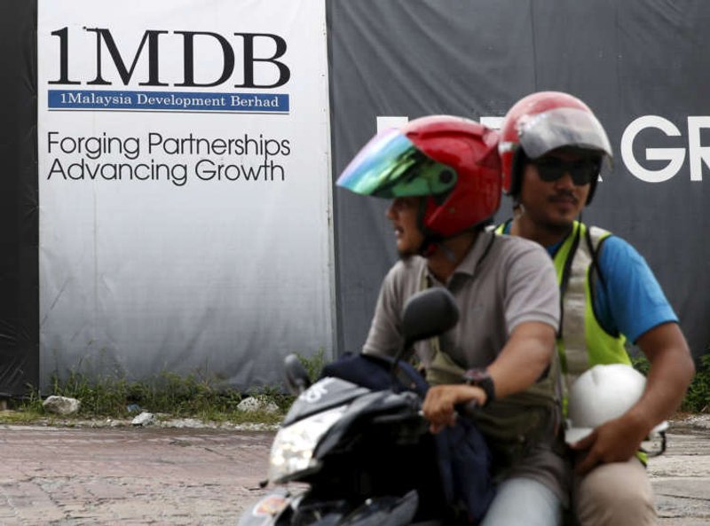 Image for Malaysia sues Deutsche Bank, JP Morgan, Coutts over 1MDB