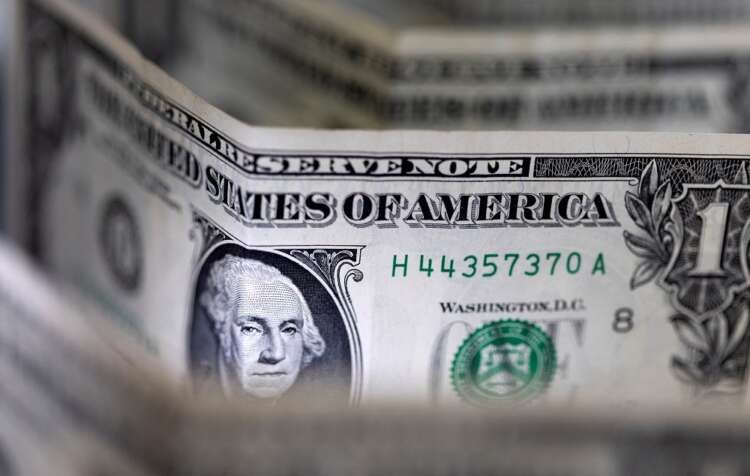 U.S. dollar banknotes symbolizing currency fluctuations amid debt deal hopes - Global Banking & Finance Review