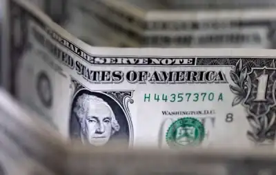 Image for Dollar weakens after gains all week; debt deal hopes boost market sentiment