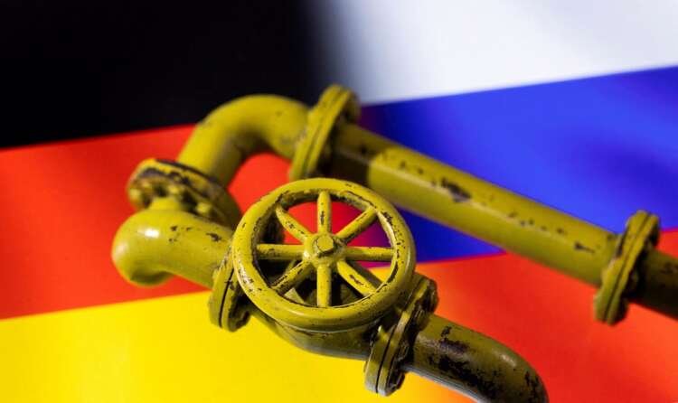 Illustration of gas pipes with German and Russian flags, symbolizing Germany's reliance on Russian gas supplies - Global Banking & Finance Review