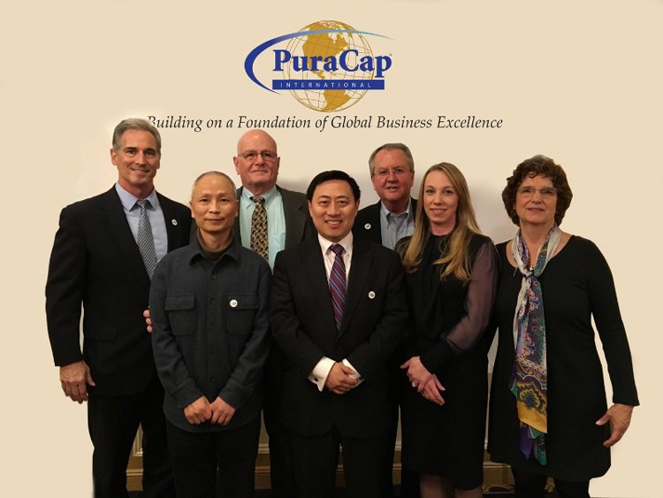 Puracap Pharmaceutical LLC team celebrating acquisition of Blu Pharmaceuticals LLC - Global Banking & Finance Review