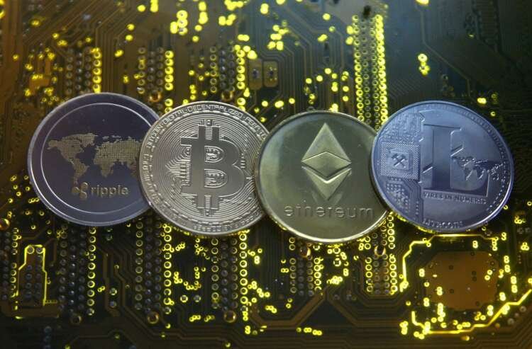 Illustration of major cryptocurrencies including Bitcoin, Ripple, and Ethereum amidst the crypto crash - Global Banking & Finance Review