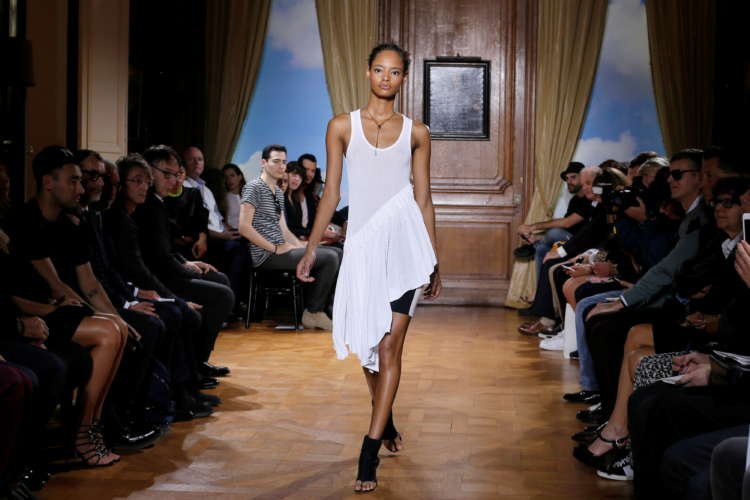 Model showcasing luxury fashion during Paris Fashion Week - Global Banking & Finance Review