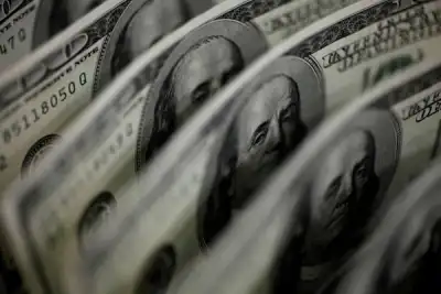 Image for Dollar rises from near three-week low as traders brace for inflation data