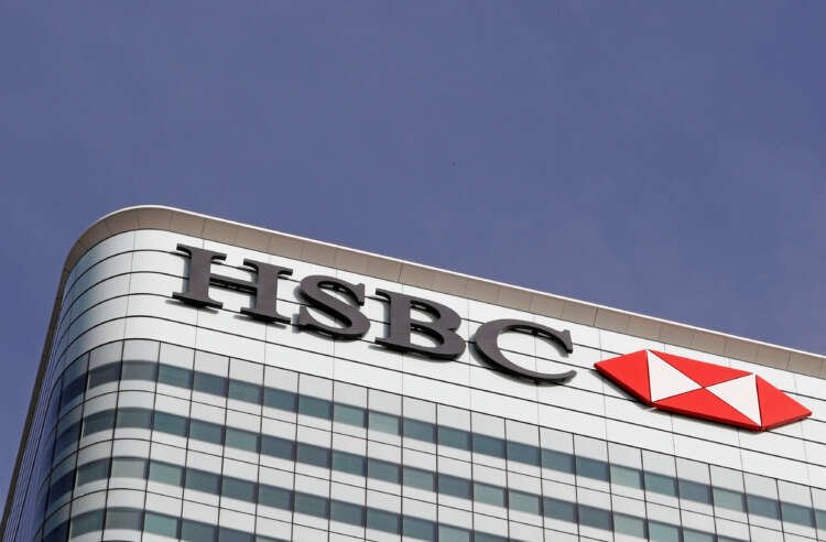 FILE PHOTO: FILE PHOTO – The HSBC bank logo is seen at their offices in the Canary Wharf financial district in London