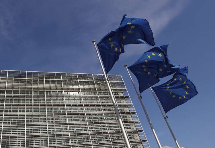 European Union flags at the Commission headquarters signify unity on Ukraine reconstruction - Global Banking & Finance Review