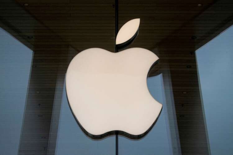 Apple logo displayed at a store, highlighting iPhone production changes - Global Banking & Finance Review