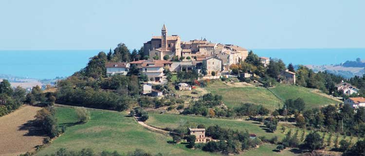 Scenic hilltop town in Le Marche, Italy, symbolizing retirement dreams - Global Banking & Finance Review