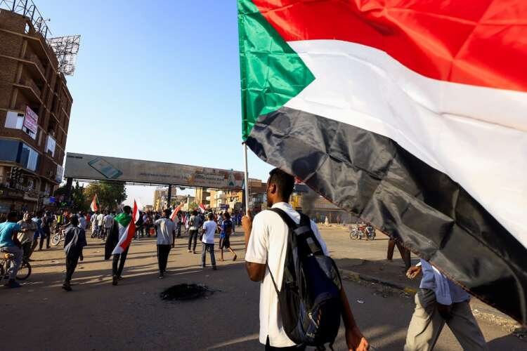 Protesters rally against military rule in Khartoum, marking uprising anniversary - Global Banking & Finance Review