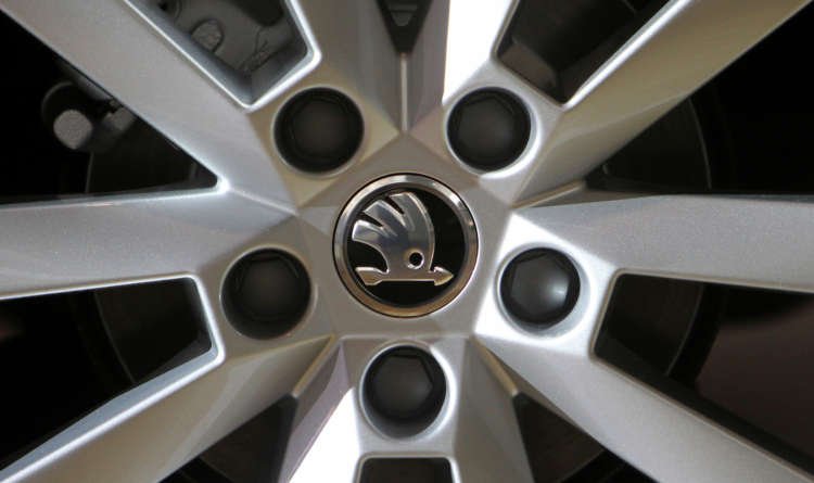 Skoda logo on a wheel of an Octavia car, representing VW's investment in new technologies - Global Banking & Finance Review