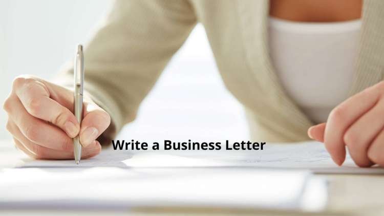 Professional setting with a person writing a business letter - Global Banking & Finance Review