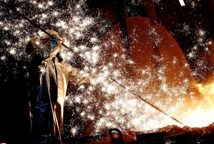 Steel worker at ThyssenKrupp AG's blast furnace amid rising German industrial orders - Global Banking & Finance Review