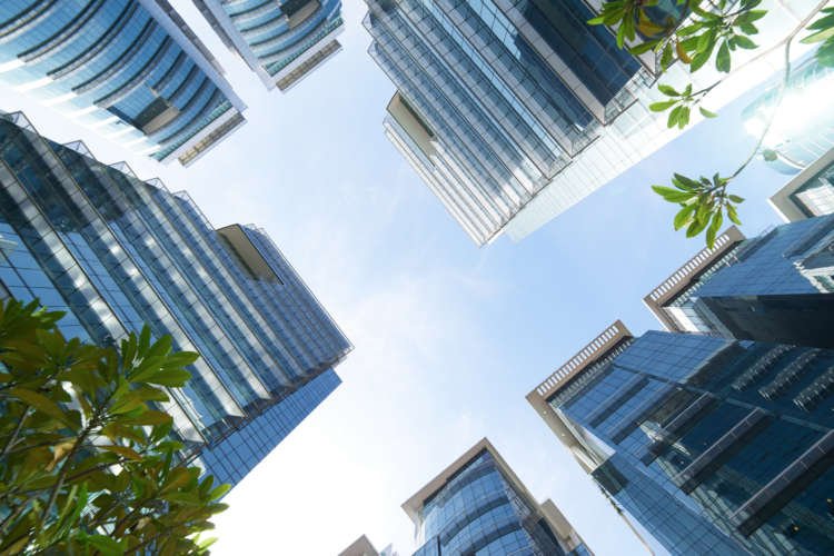 graphicstock-common-modern-business-skyscrapers-high-rise-buildings-architecture-raising-to-the-sky-sun-concepts-of-financial-economics-future-etc_BuAeYsvgie