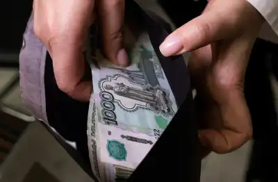 Image for Russian rouble at 110 to US dollar, down by one quarter since early August