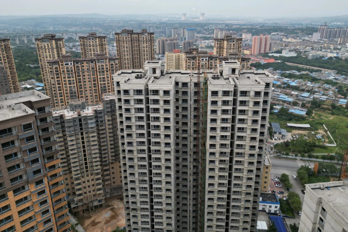 Unfinished residential buildings in China reflecting the struggling property market - Global Banking & Finance Review