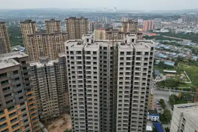 Image for China slashes mortgage reference rates to revive property market