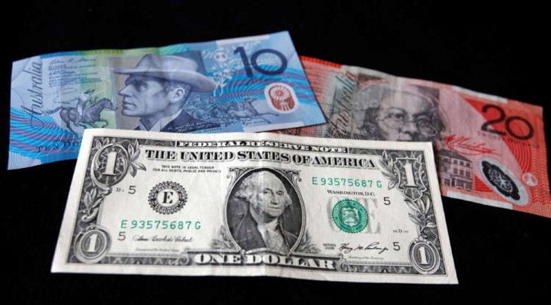 Image for Dollar edges lower as investors favor higher-risk currencies
