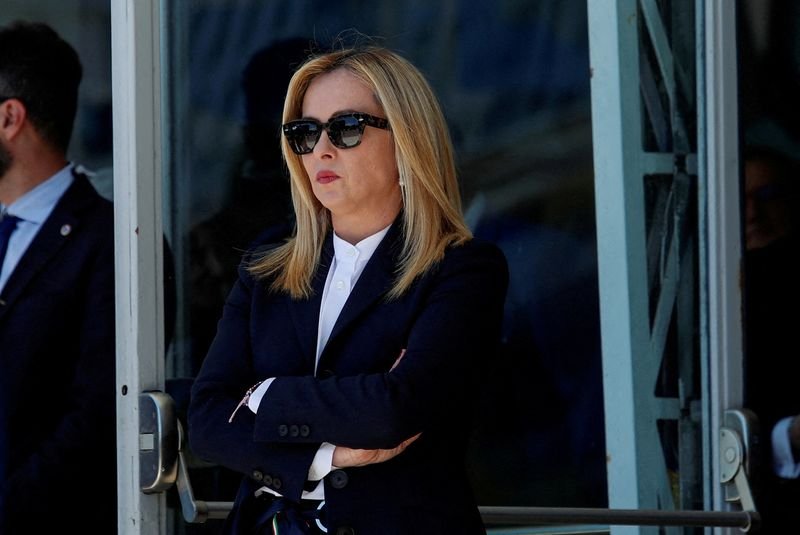 Italy's Prime Minister Giorgia Meloni addressing police on Albanian migrant deal - Global Banking & Finance Review