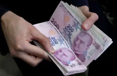 Image for Dollar slips, along with yields on U.S. treasuries; lira tanks