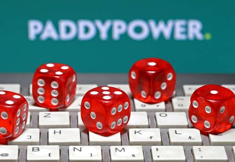 Paddy Power logo with gambling dice illustrating Flutter's U.S. growth - Global Banking & Finance Review