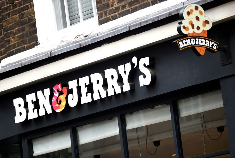 Ben & Jerry's logo with Unilever's corporate logo, representing the controversy over silence on Trump - Global Banking & Finance Review