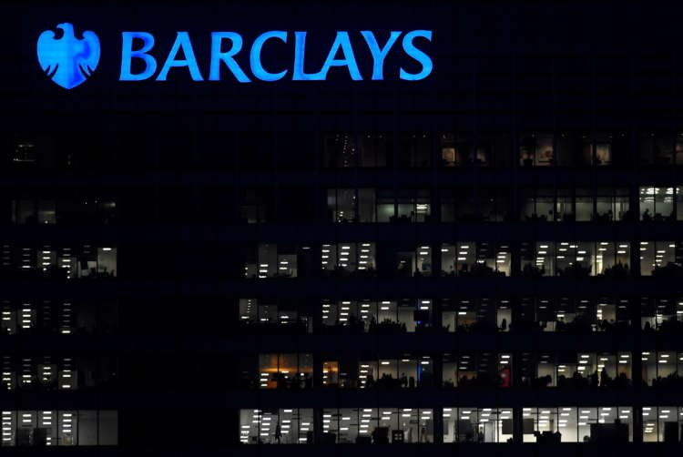 Image for Barclays resumes dividend as annual profit halves