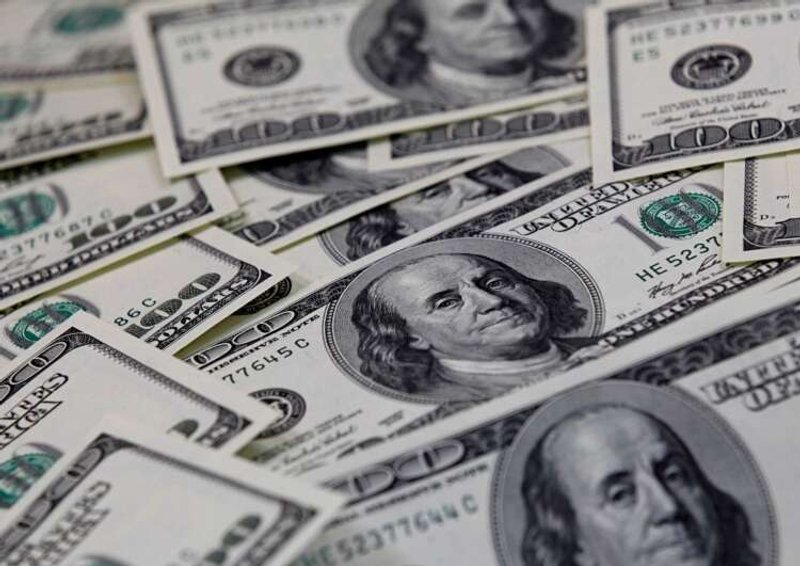 Image for U.S. dollar rises to two-week high as Fed taper view builds