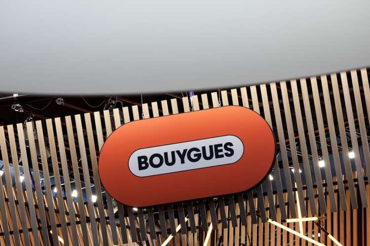 Bouygues Telecom logo with financial graphs, highlighting profit growth - Global Banking & Finance Review